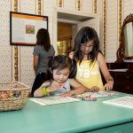 Aaliyah O'Brien (left) and Gwen O'Brien (right) at the coloring exhibit inside the Museum © The National Trust for Historic Preservation