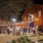 A nighttime reception at the Cooper Barns